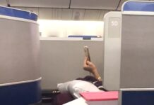 Пасажир Бізнес-Класу Ігнорує Правила Польоту, Викликаючи Спори про Дотримання